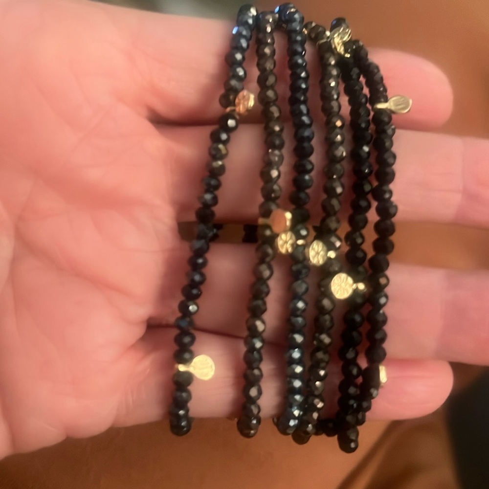 Tiny glass beaded, black and gold stretch bracelet